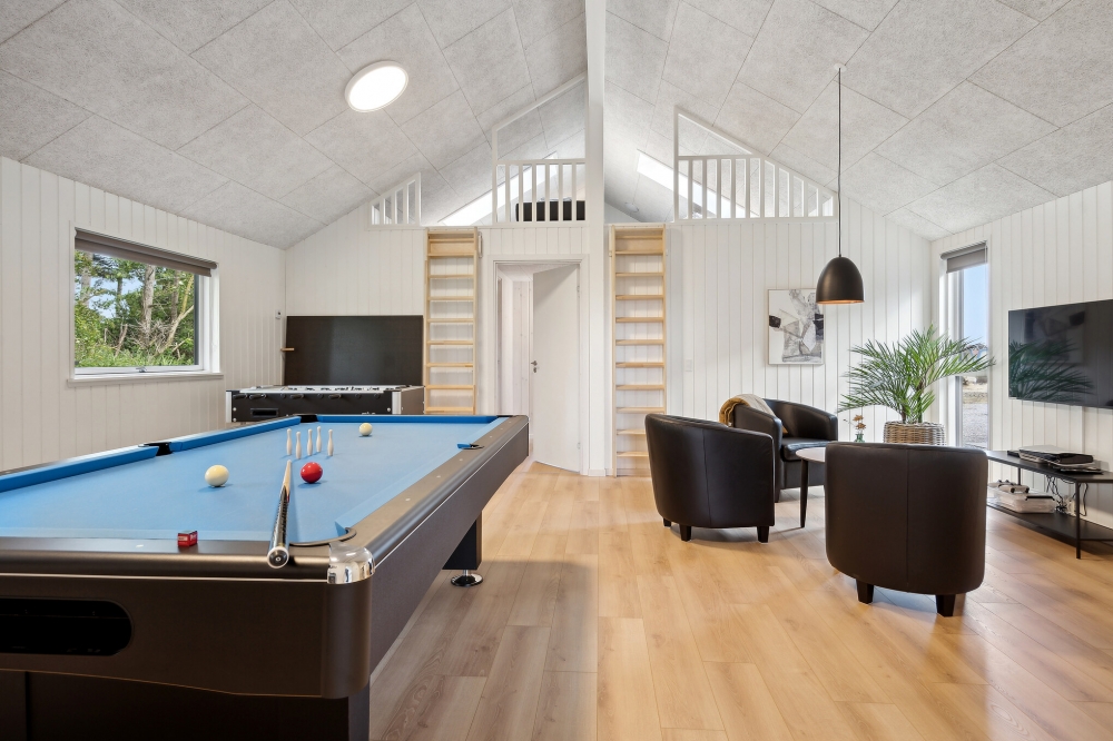 Neben den vielen schönen Stunden, die man im Poolbereich des Hauses verbringen kann, bietet das Luxusferienhaus 616 auch Spielevergnügen bei Billard/Tischtennis und Darts
