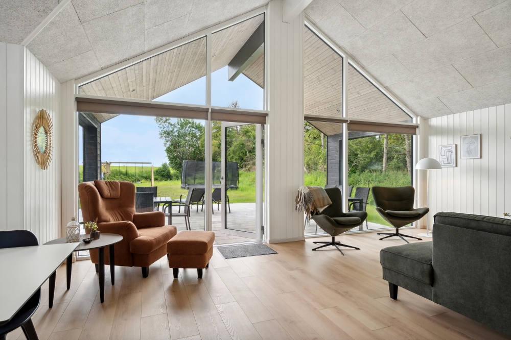 Die Couch im Luxusferienhaus Nr. 616 in Fünen und seine Inseln lädt zu Gesellschaftsspielen oder zu Kinoabenden ein.