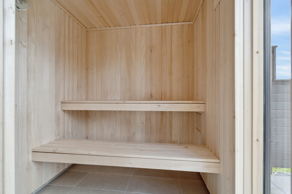 Genießen Sie die heiße Sauna im Luxusferienhaus Nr. 616 für 16 Personen