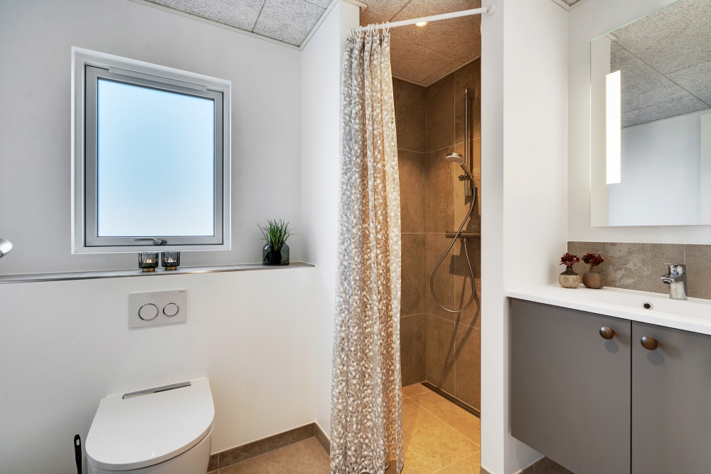 Eines der Badezimmer im Luxusferienhaus Nr. 621