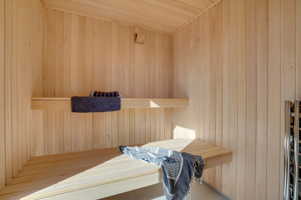 Genießen Sie die heiße Sauna im Luxusferienhaus Nr. 622 für 18 Personen