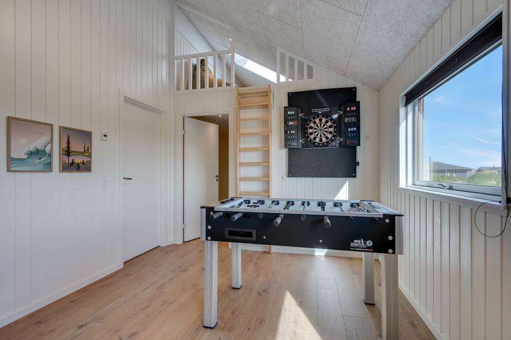 Das Luxusferienhaus 622 für 18 Personen hat einen großen Aktivitätsraum mit u. a. Billard und Darts