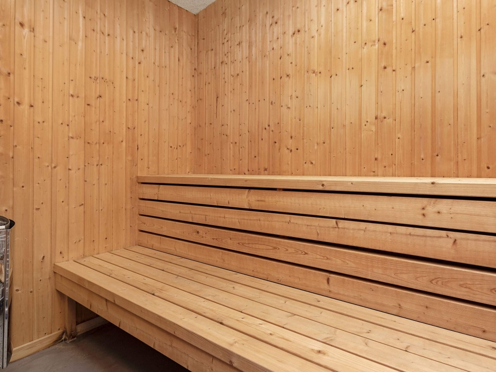 Genießen Sie die heiße Sauna im Luxusferienhaus Nr. 626 für 14 Personen