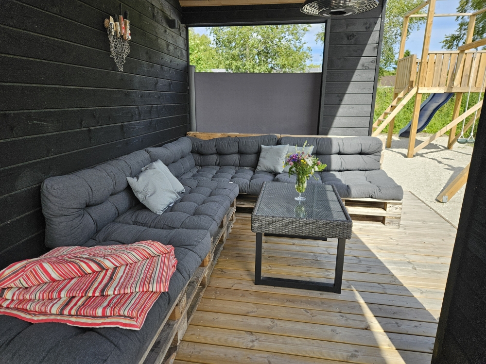 Das Luxusferienhaus Nr. 628 hat eine tolle Terrasse, die mit hochwertigen Gartenmöbeln für 12 Personen ausgestattet ist.