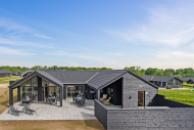 Dieses schöne Poolhaus Nr. 632 mit Platz für 18 Personen liegt in Südjütland