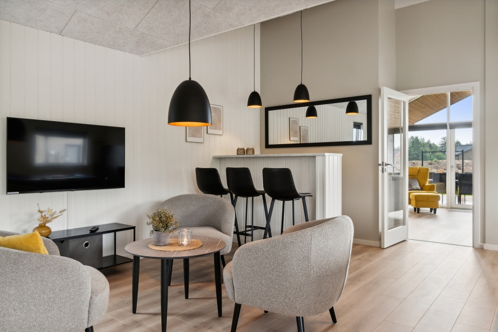 Die tollen Ferienhäuser sind unter anderem mit einer Bar ausgestattet, wie in diesem Luxusferienhaus 634 in Nordjütland