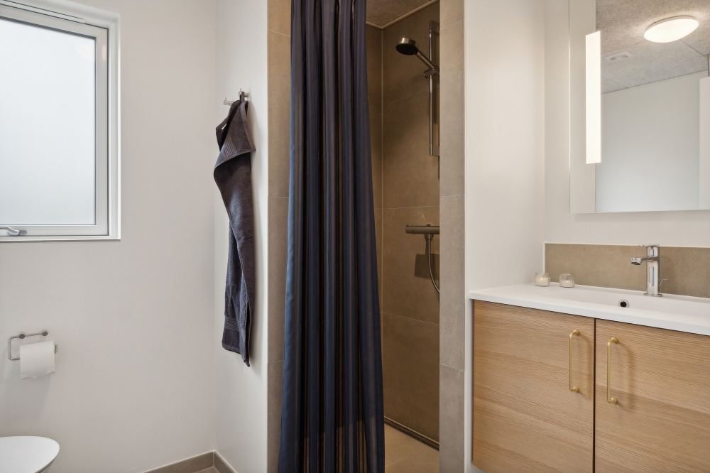 Eines der Badezimmer im Luxusferienhaus Nr. 634