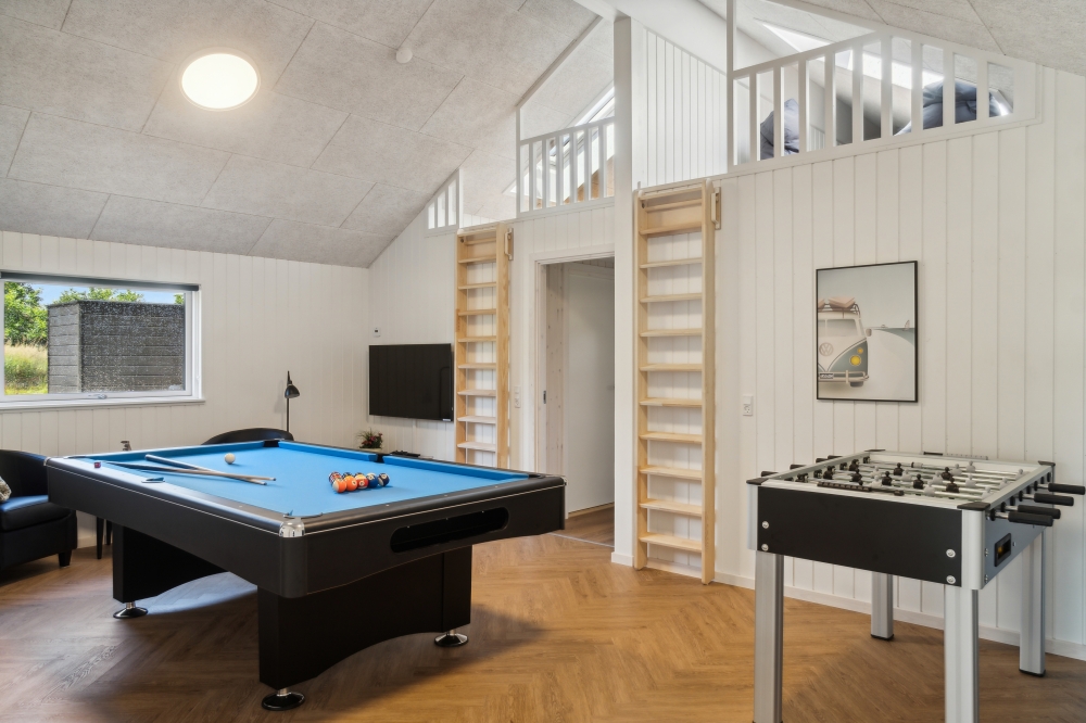 Aktivitätsraum im Luxusferienhaus Nr. 640 mit 5 Schlafzimmern und Platz für 14 Gäste.