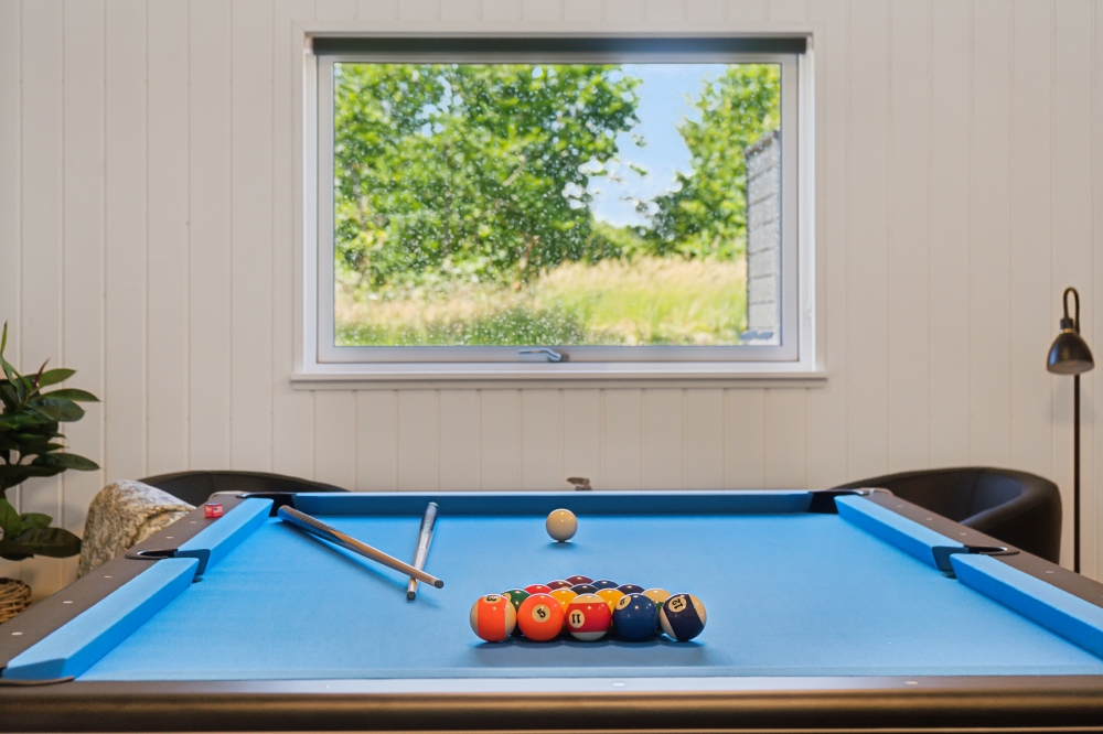 Neben den vielen schönen Stunden, die man im Poolbereich des Hauses verbringen kann, bietet das Luxusferienhaus 640 auch Spielevergnügen bei Billard/Tischtennis und Darts
