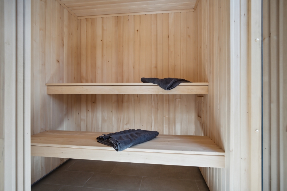 Genießen Sie die heiße Sauna im Luxusferienhaus Nr. 640 für 14 Personen