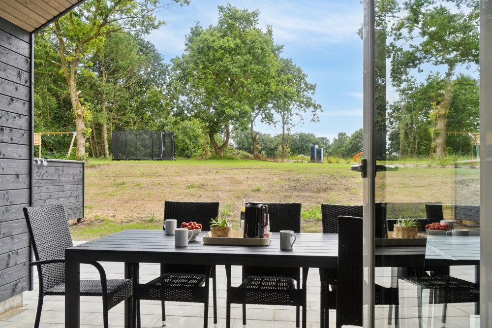 Genießen Sie einen Grillabend auf der Terrasse des Luxusferienhauses Nr. 640 in Ostjütland