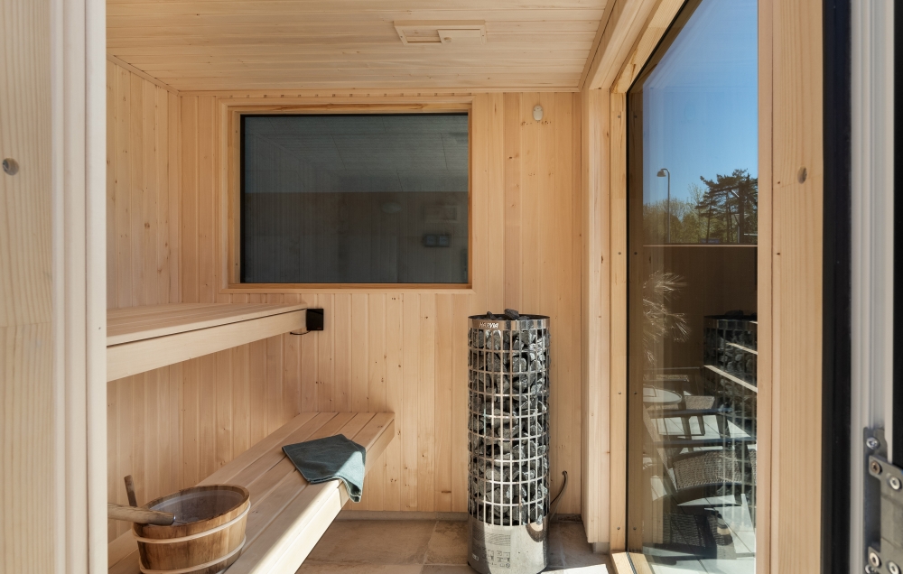 Genießen Sie die heiße Sauna im Luxusferienhaus Nr. 646 für 18 Personen