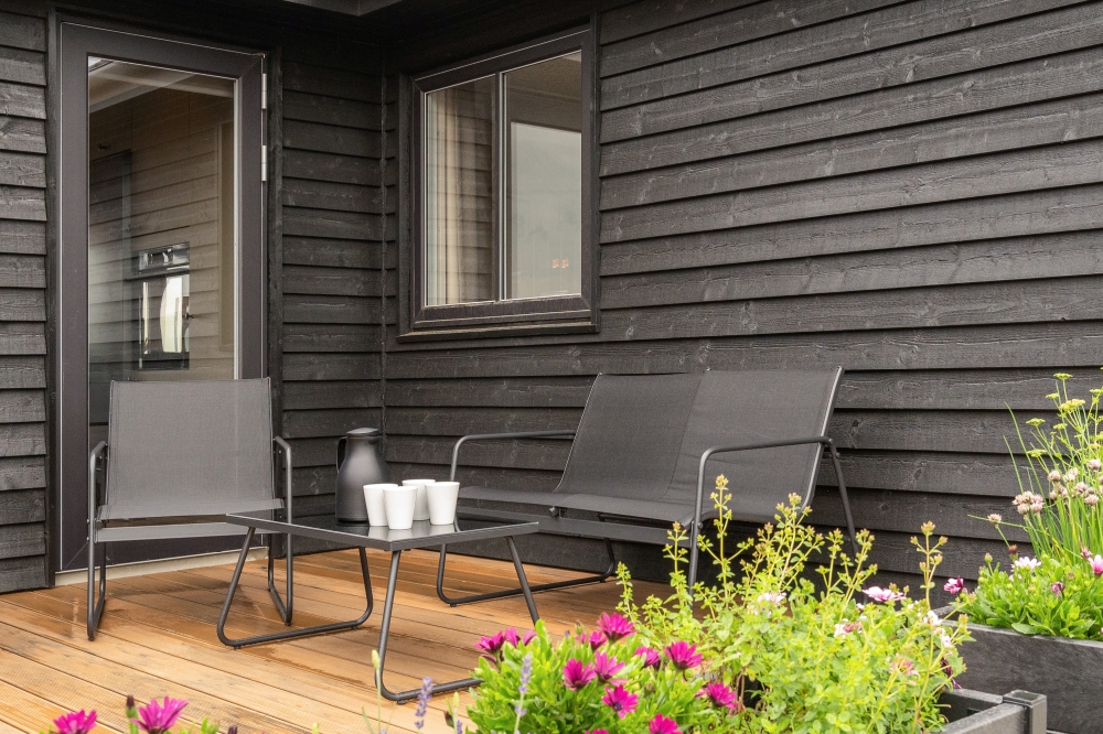 Das Luxusferienhaus Nr. 646 hat eine tolle Terrasse, die mit hochwertigen Gartenmöbeln für 18 Personen ausgestattet ist.