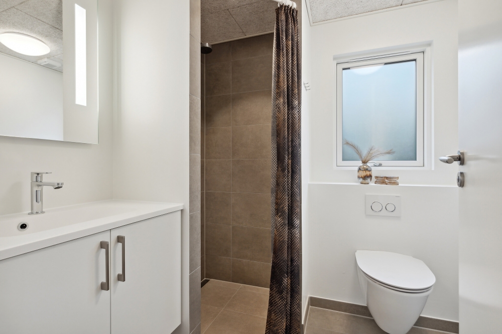 Eines der Badezimmer im Luxusferienhaus Nr. 765