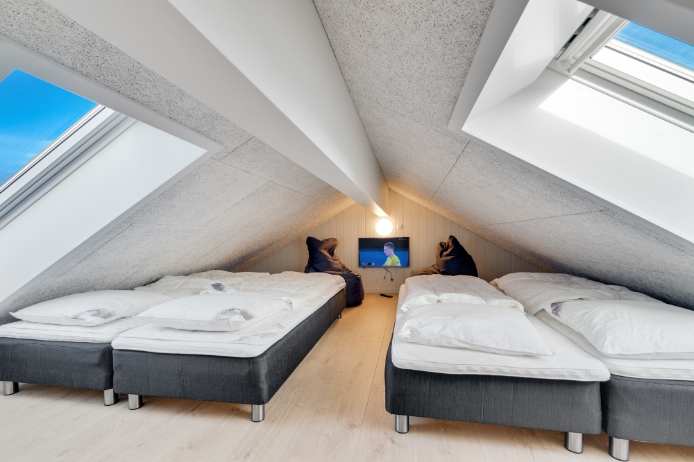 Einige der 16 Schlafgelegenheiten befinden sich im Luxusferienhaus Nr. 765 auf dem ausgebauten Dachboden