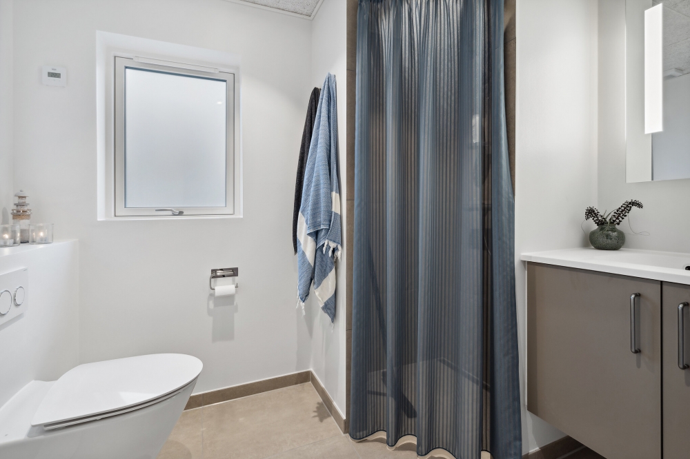 Eines der Badezimmer im Luxusferienhaus Nr. 655