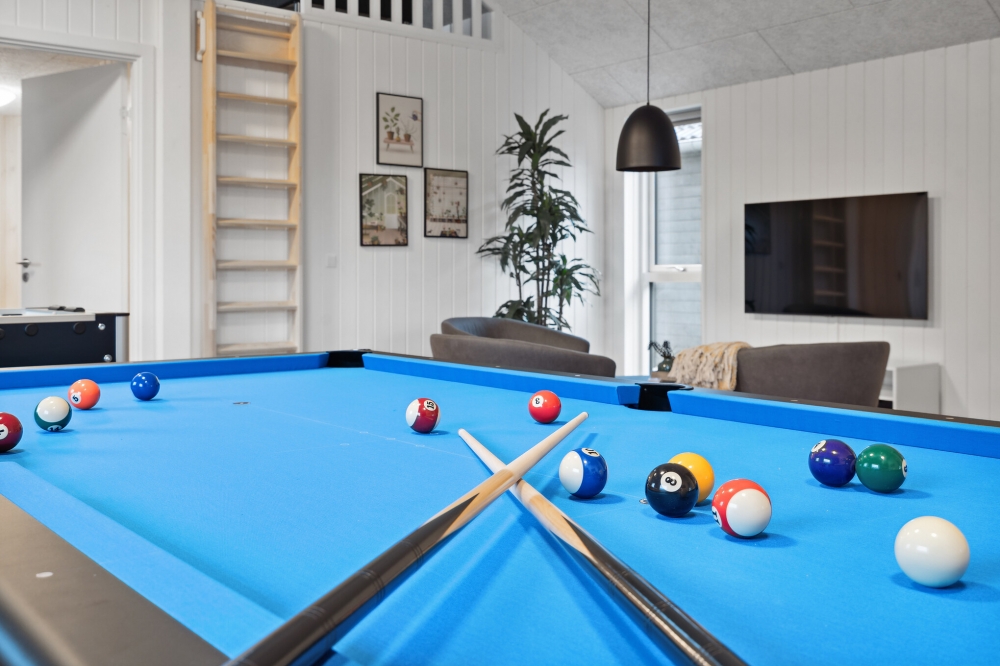 Neben den vielen schönen Stunden, die man im Poolbereich des Hauses verbringen kann, bietet das Luxusferienhaus 655 auch Spielevergnügen bei Billard/Tischtennis und Darts