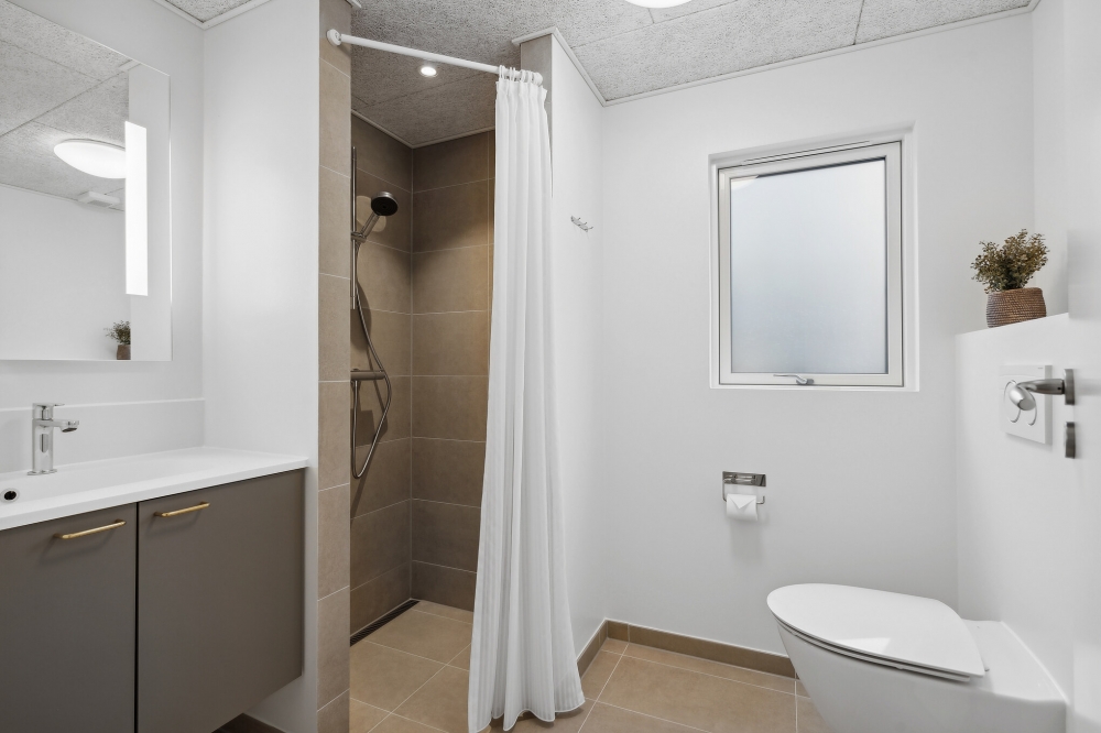 Eines der Badezimmer im Luxusferienhaus Nr. 657
