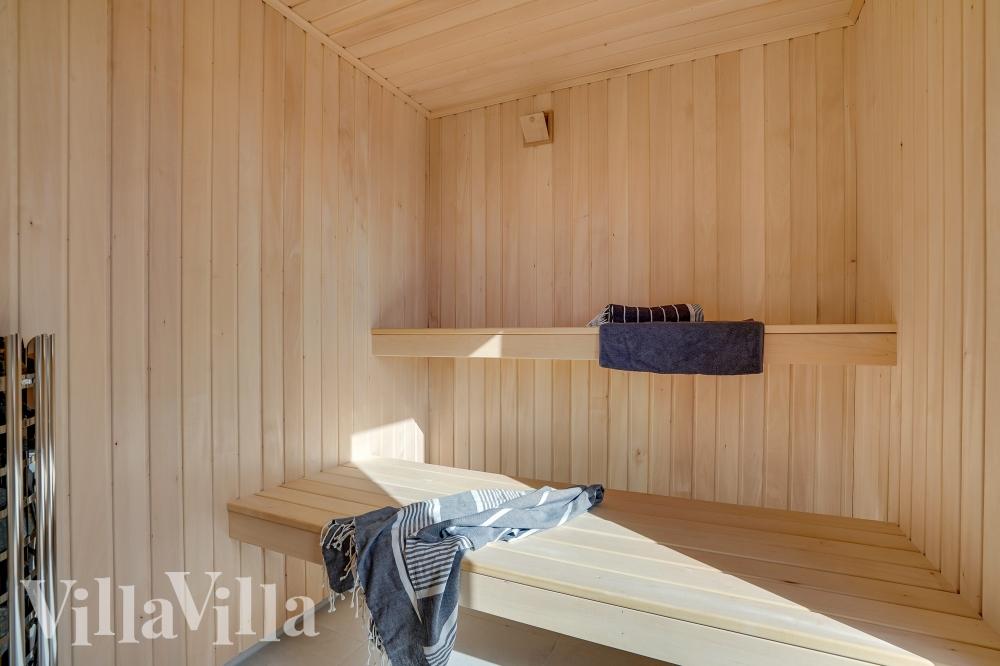Genießen Sie die heiße Sauna im Luxusferienhaus Nr. 658 für 20 Personen