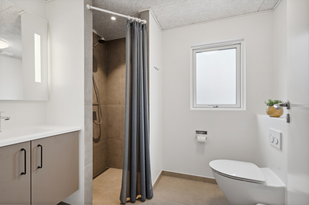 Eines der Badezimmer im Luxusferienhaus Nr. 659