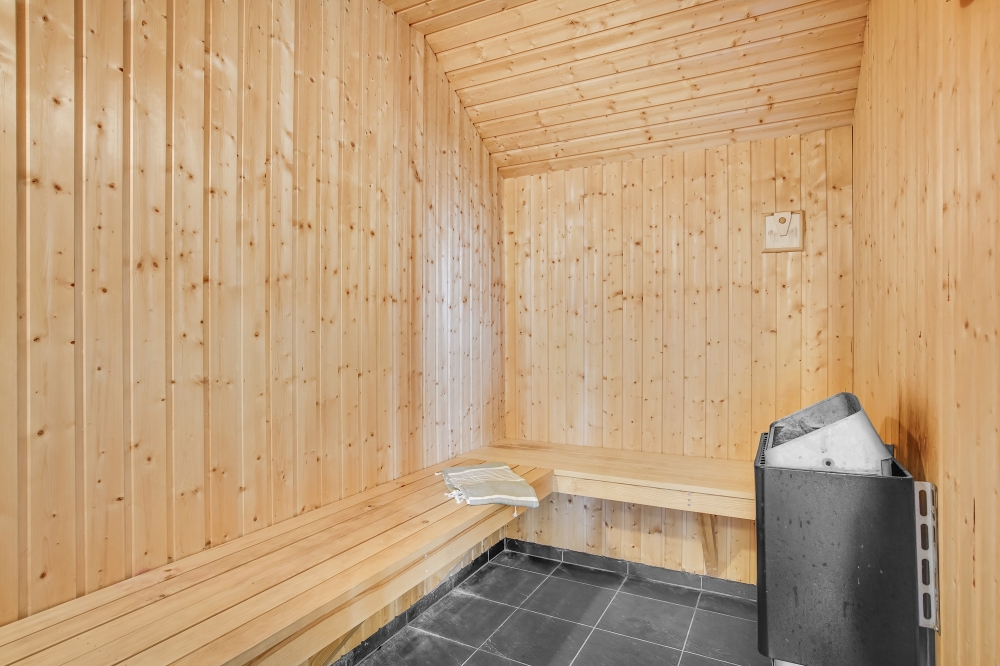 Genießen Sie die heiße Sauna im Luxusferienhaus Nr. 236 für 14 Personen