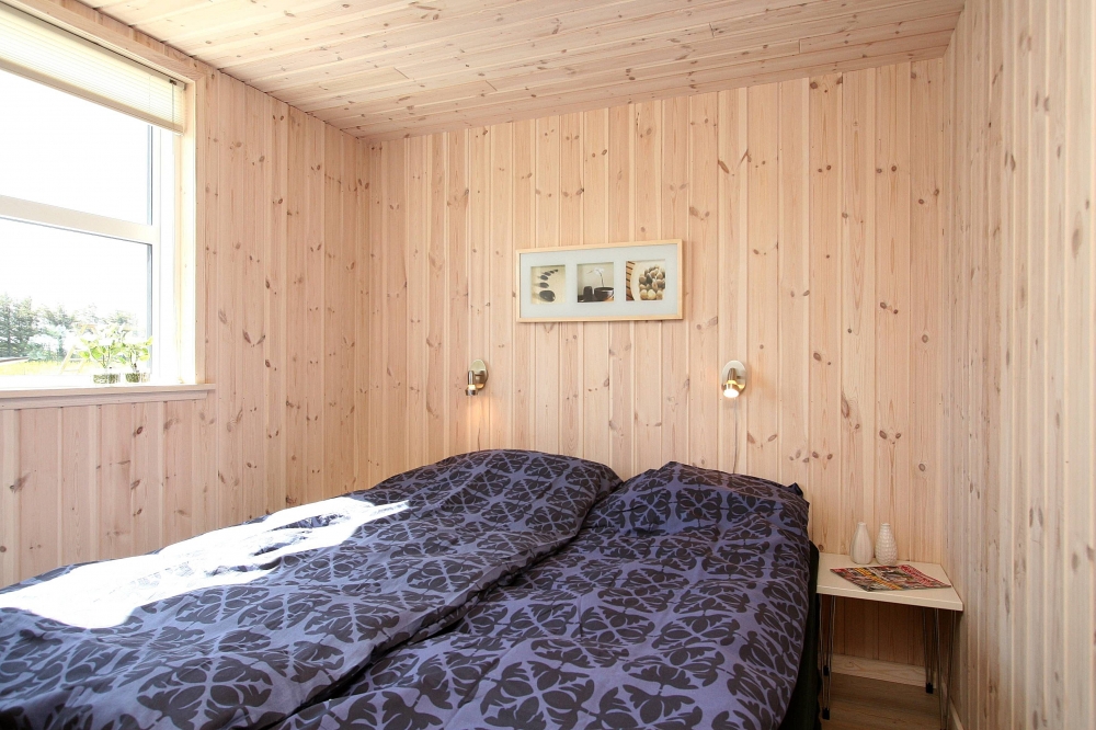 Eines der 9 Schlafzimmer im Luxusferienhaus Nr. 192