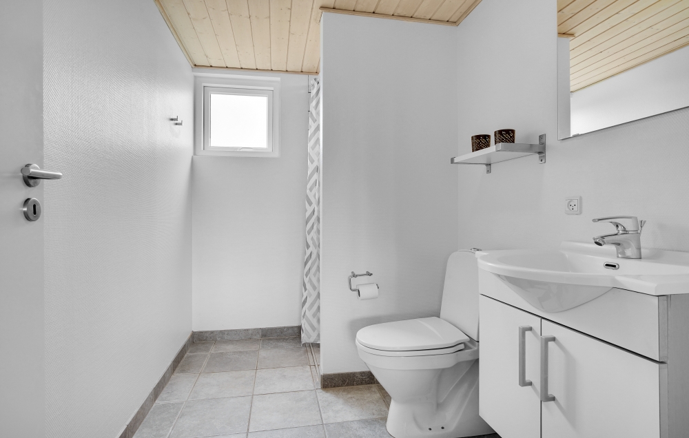 Eines der Badezimmer im Luxusferienhaus Nr. 194