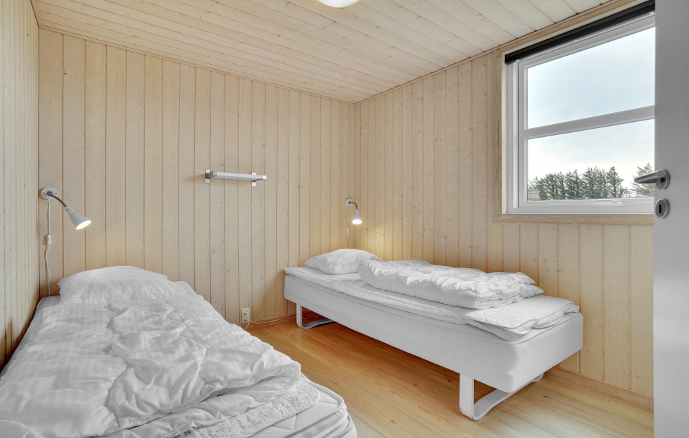 Eines der 8 Schlafzimmer im Luxusferienhaus Nr. 194