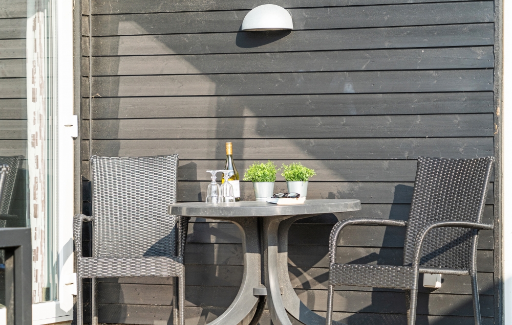 Genießen Sie einen Grillabend auf der Terrasse des Luxusferienhauses Nr. 194 in Nordjütland
