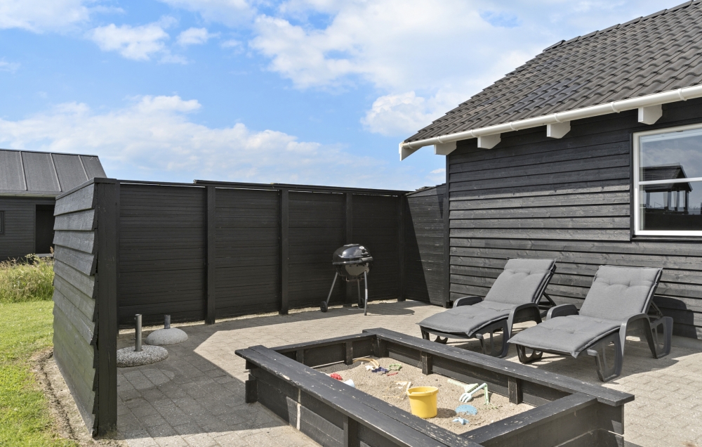 Genießen Sie einen Grillabend auf der Terrasse des Luxusferienhauses Nr. 193 in Nordjütland