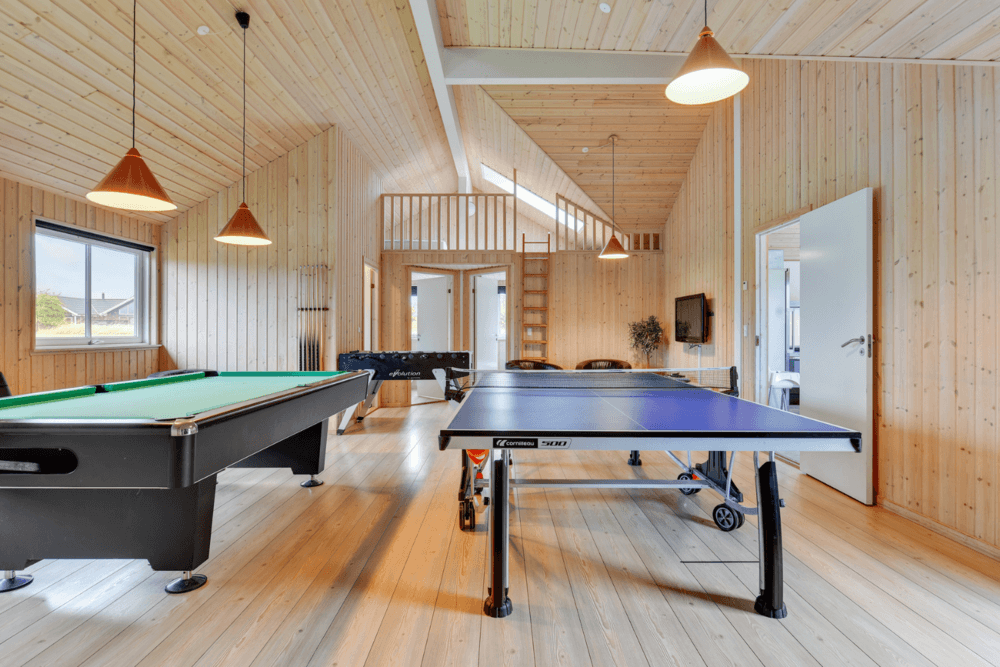 Neben den vielen schönen Stunden, die man im Poolbereich des Hauses verbringen kann, bietet das Luxusferienhaus 231 auch Spielevergnügen bei Billard/Tischtennis und Darts