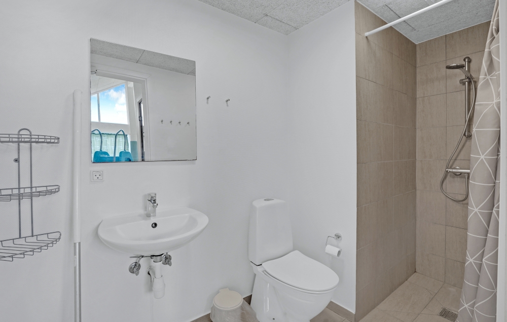 Eines der Badezimmer im Luxusferienhaus Nr. 271