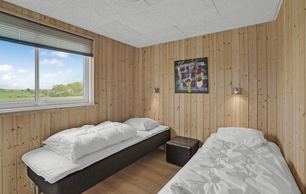 Eines der 5 Schlafzimmer im Luxusferienhaus Nr. 271