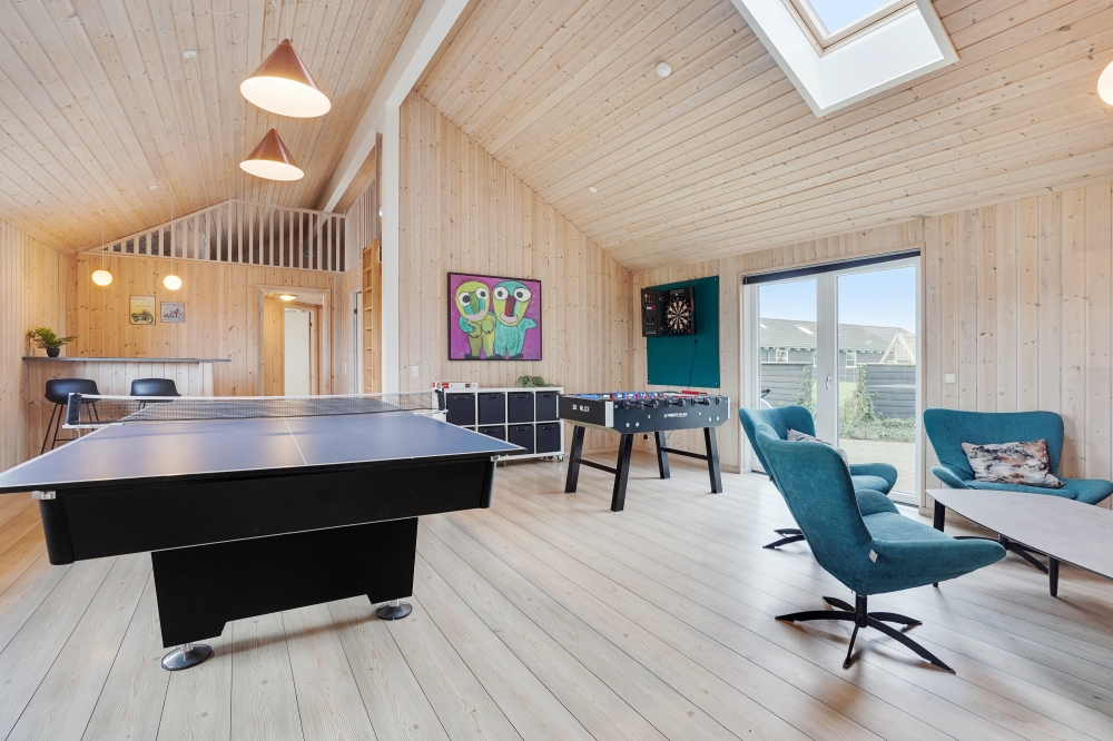 Neben den vielen schönen Stunden, die man im Poolbereich des Hauses verbringen kann, bietet das Luxusferienhaus 234 auch Spielevergnügen bei Billard/Tischtennis und Darts
