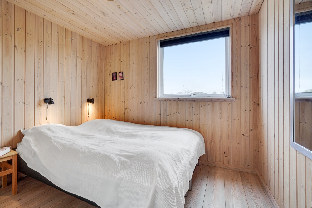 Eines der 7 Schlafzimmer im Luxusferienhaus Nr. 234