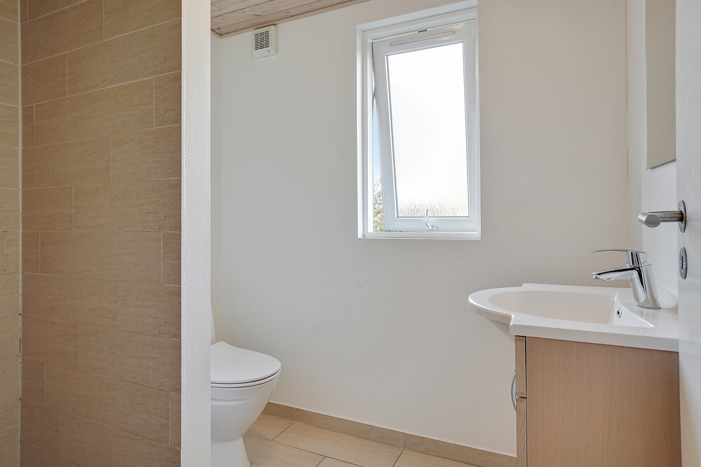 Eines der Badezimmer im Luxusferienhaus Nr. 237