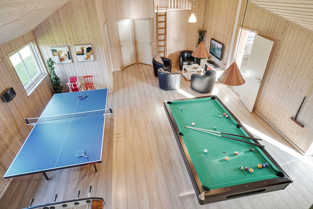 Neben den vielen schönen Stunden, die man im Poolbereich des Hauses verbringen kann, bietet das Luxusferienhaus 237 auch Spielevergnügen bei Billard/Tischtennis und Darts