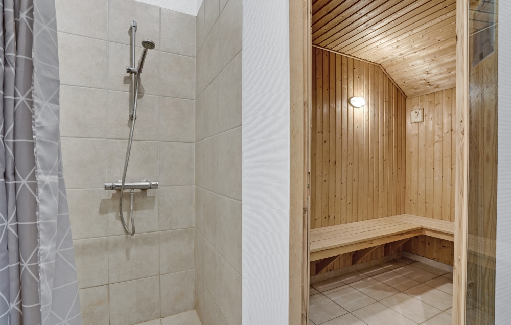 Genießen Sie die heiße Sauna im Luxusferienhaus Nr. 262 für 14 Personen