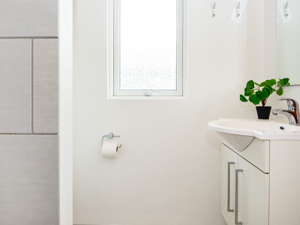Eines der Badezimmer im Luxusferienhaus Nr. 293