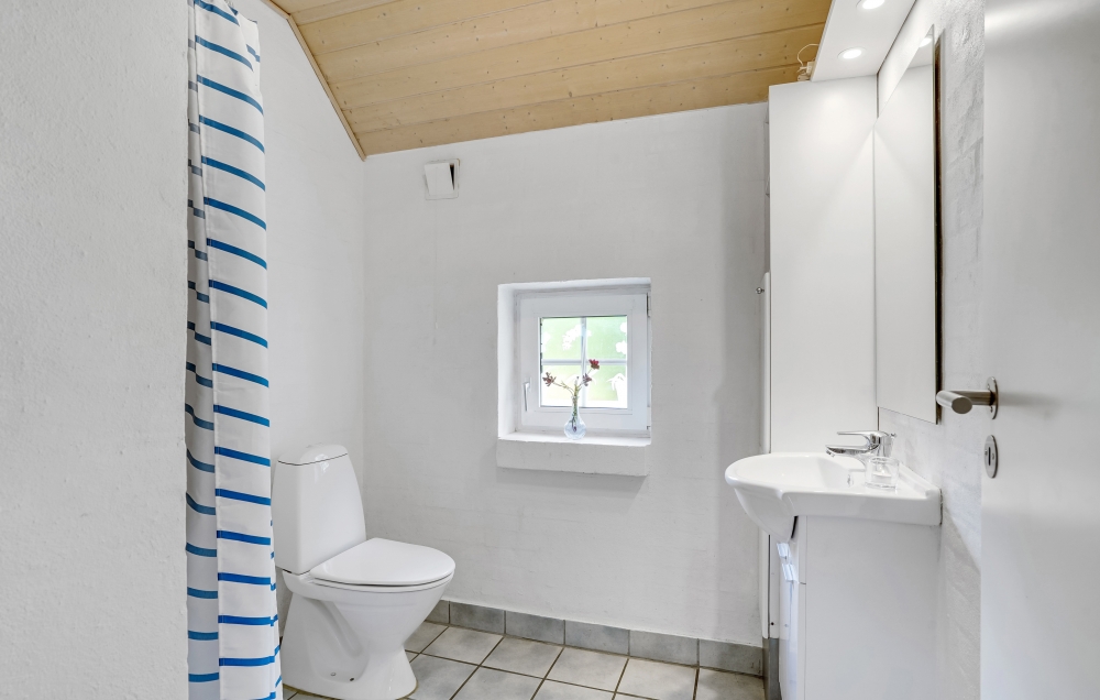 Eines der Badezimmer im Luxusferienhaus Nr. 135