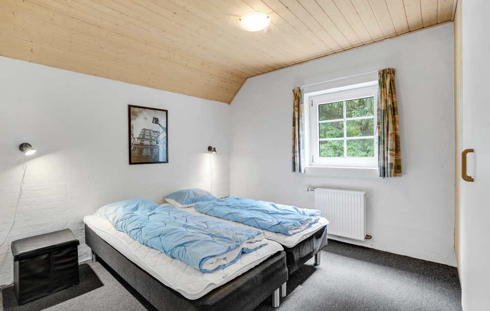 Eines der 9 Schlafzimmer im Luxusferienhaus Nr. 135