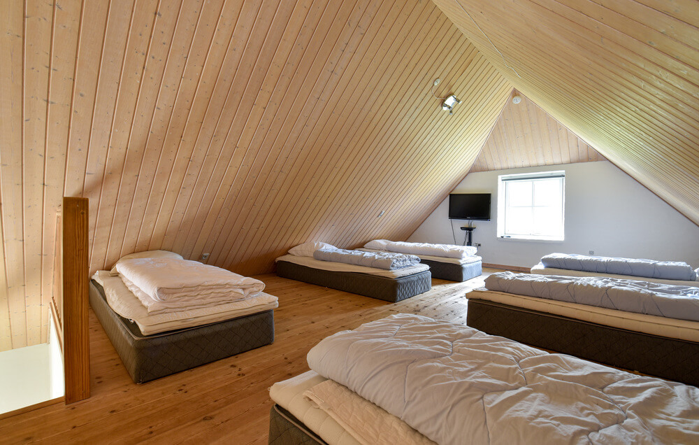 Einige der 24 Schlafgelegenheiten befinden sich im Luxusferienhaus Nr. 146 auf dem ausgebauten Dachboden