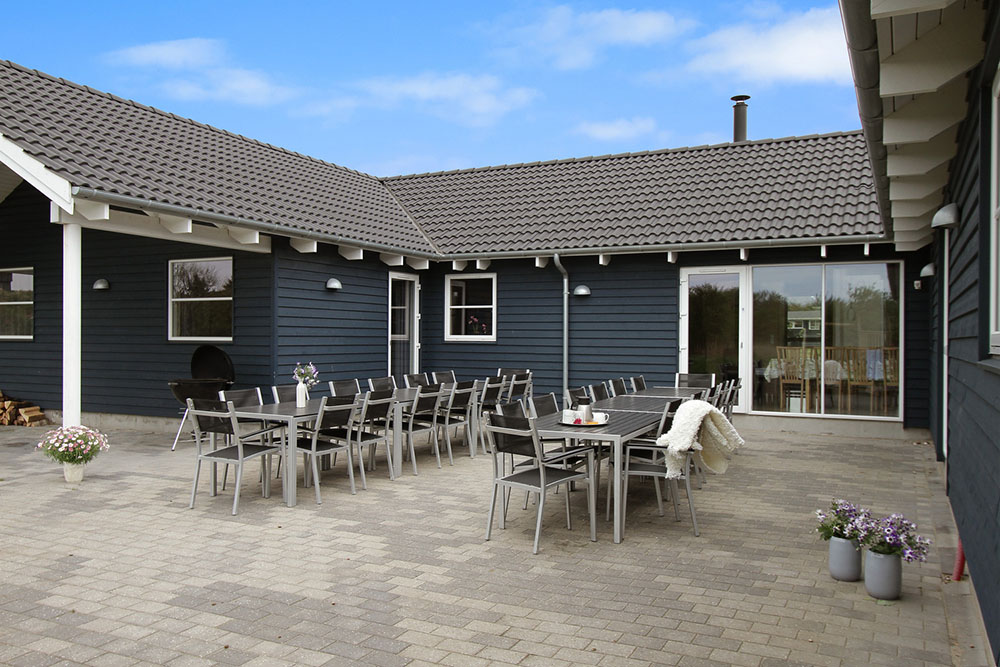 Genießen Sie einen Grillabend auf der Terrasse des Luxusferienhauses Nr. 283 in Westjütland