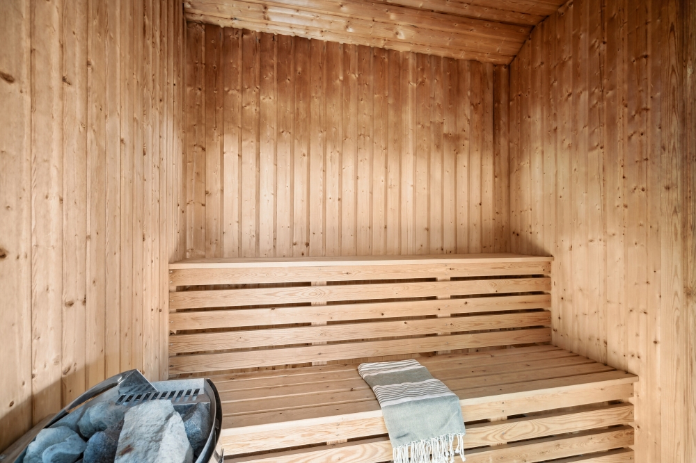 Genießen Sie die heiße Sauna im Luxusferienhaus Nr. 176 für 24 Personen