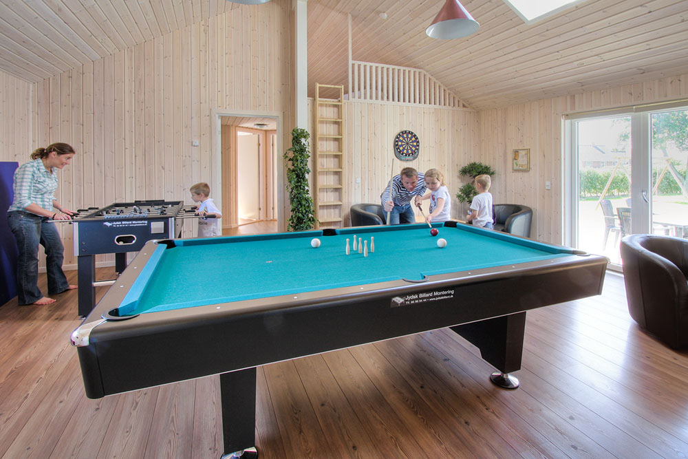 Neben den vielen Stunden, die man im Poolbereich verbringen kann, hat das Haus noch Weiteres zu bieten. Es gibt nämlich einen Aktivitätenraum mit Billard/Tischtennis und Dart