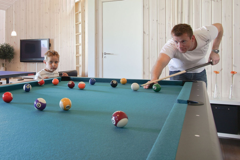 In diesem toll ausgestatteten Poolhaus mit u.a. Billard, Tischtennis, Kicker und Dart fühlt man sich das ganze Jahr hindurch willkommen