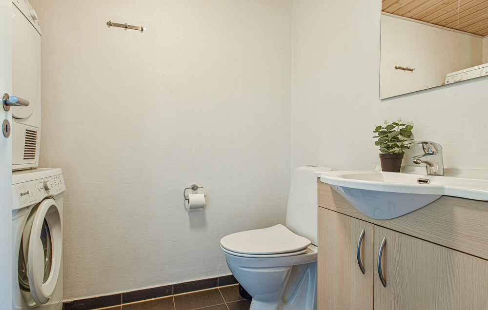 Eines der Badezimmer im Luxusferienhaus Nr. 224