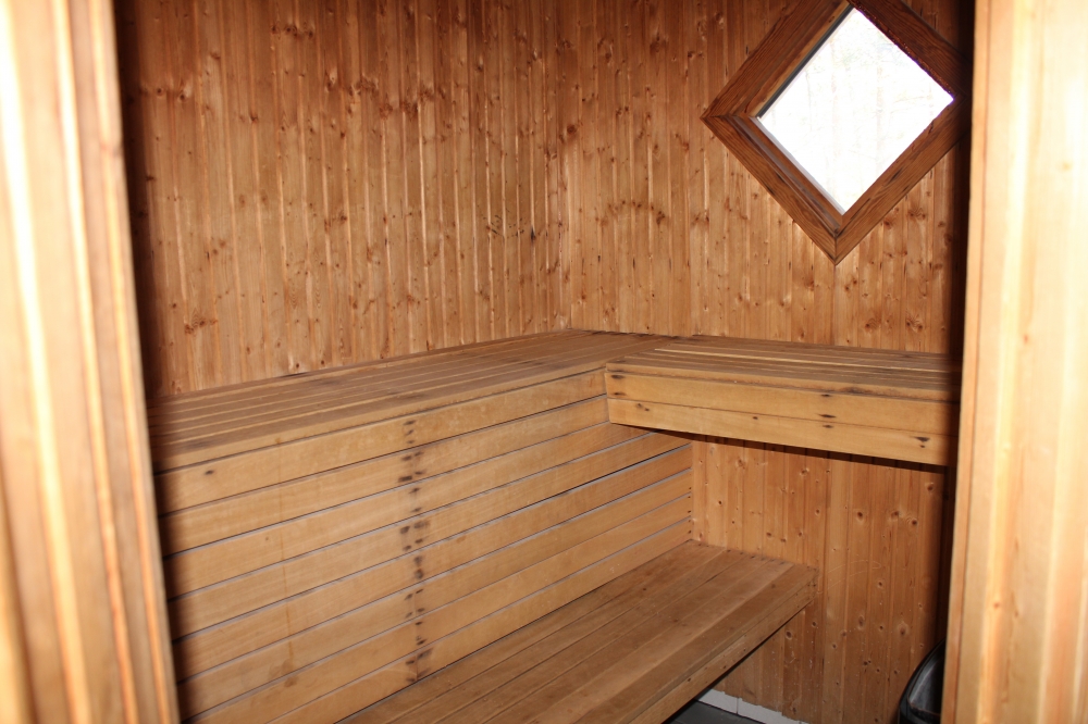 Genießen Sie die heiße Sauna im Luxusferienhaus Nr. 127 für 12 Personen