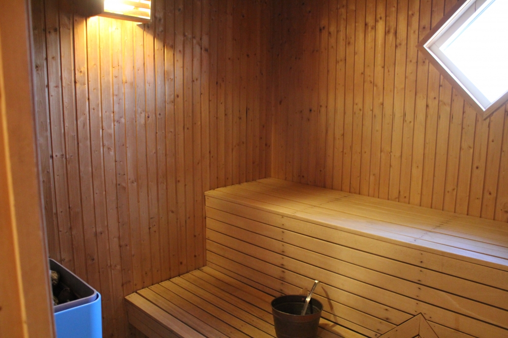 Genießen Sie die heiße Sauna im Luxusferienhaus Nr. 78 für 14 Personen