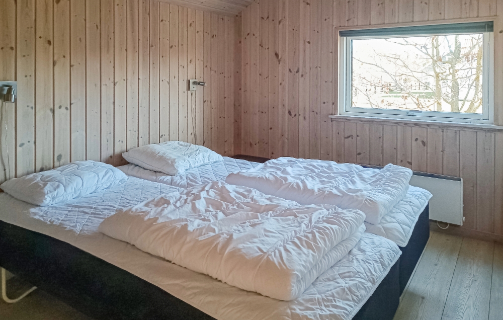 Eines der 5 Schlafzimmer im Luxusferienhaus Nr. 244